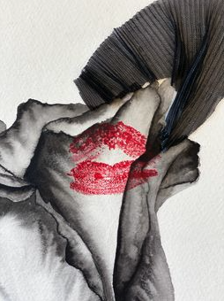 Kiss on a black rose in a veil